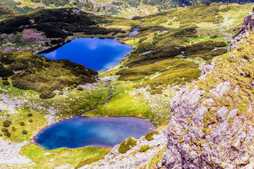 Landscape with a glacial lake in the highlands of Fagaras mounta