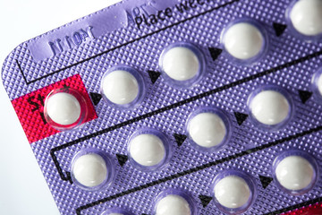 Contraceptive Pill , Hormonal pills on white