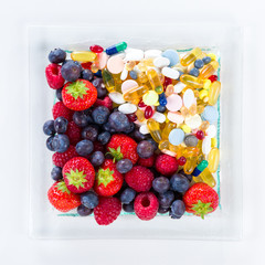 Healthy lifestyle, Fruit and pills, vitamin supplements