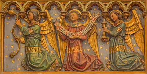 Fototapeta na wymiar Bruges - Carved relief of angels - St. Salvator's Cathedral