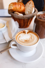 cappuccino with croissants