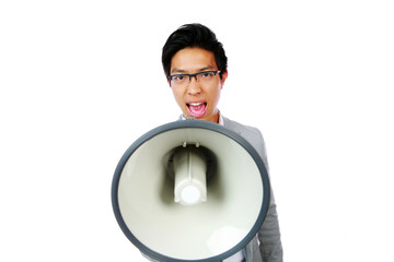 Portrait of young asian man shouting with megaphone