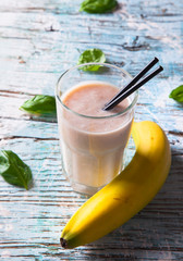 Fresh milk shake on wood