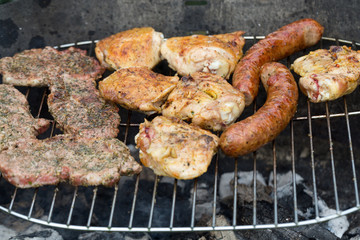 barbecue with delicious grilled meat on grill