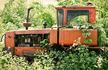 Abandoned tractor in the grass