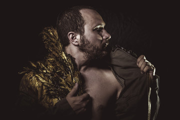 wild, man beard and suit made with golden wings