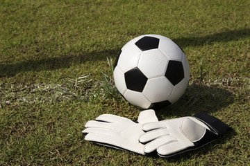 Gloves and soccer ball