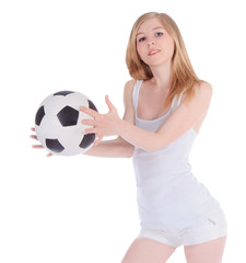 Young caucasian female with soccer ball on white background