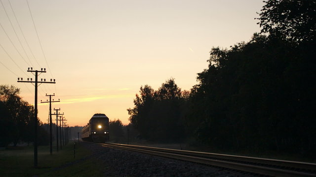 Train passing by in the countryside.