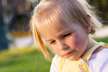 Cute little girl in a park