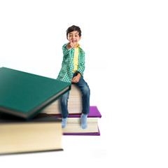 Kid on several books over white background