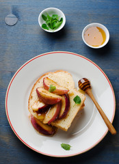Toasts with peaches and butter