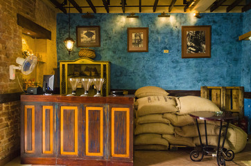 Interior of a typical cafe in Havana with coffee bags