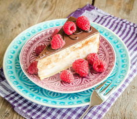 Chocolate cake decorated with fresh raspberries