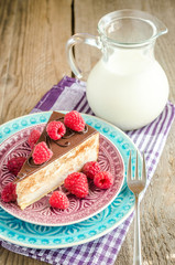 Chocolate cake decorated with fresh raspberries