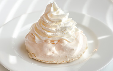 Meringue cake with whipped cream