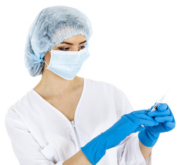 beautiful woman doctor preparing a syringe for an injection