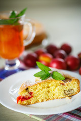 Biscuit cake with cherry plums