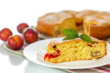 Biscuit cake with cherry plums