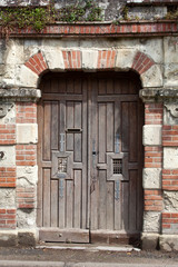 Fototapeta na wymiar ancient brown wooden door