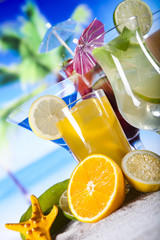Tropical drinks on beach and sun 