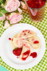 Tasty  sweet dumplings with fresh strawberry