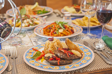 Fototapeta na wymiar A la carte steak meal on patterned plate