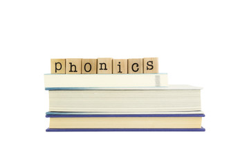 phonics word on wood stamps and books - obrazy, fototapety, plakaty
