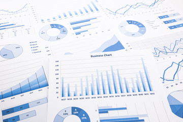blue business charts, graphs, reports and paperwork