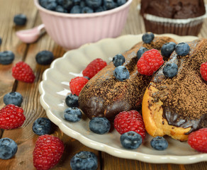 Eclairs with berries