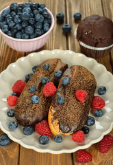 Eclairs with berries