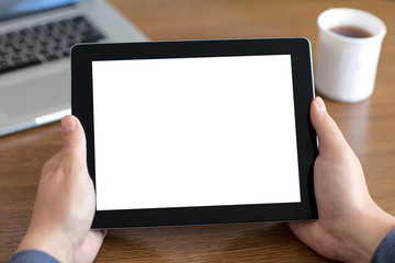 male hands holding a tablet with isolated screen against the bac