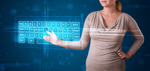 Girl pressing virtual type of keyboard