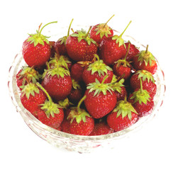 Strawberries in bowl isolated on white