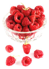 Raspberries in bowl isolated on white