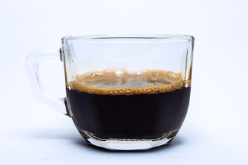 coffee in glass cup, isolated on white background.
