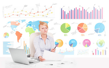 Business woman with colorful charts