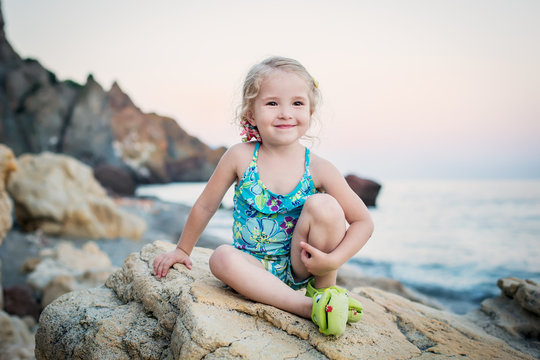 happy little girl on the beach