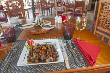 A la carte chinese meal on patterned plate