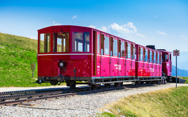 Fototapeta na wymiar Steam trainn railway carriage going to Schafberg Peak