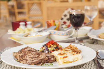 A la carte steak meal on patterned plate