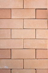 Brown brick wall.