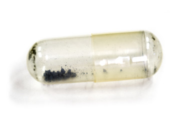 Sample of the rare element Osmium. Container is 2cm long.