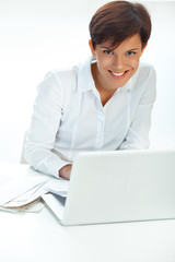  business woman with  laptop working in office