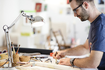Obraz premium Architect Working On Blueprint