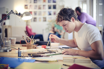 Architect Working On Blueprint