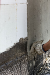 Hauswand verputzen