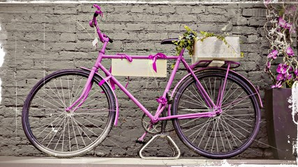 Fototapeta na wymiar vintage bicycle against old brick wall