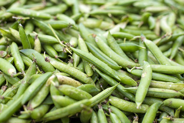 Fresh green peas on the market
