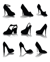 Black silhouettes and and shadow of shoes, vector